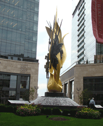 Daytime view of Katyn Memorial showing fountain and lovely gardens Harbor East Baltimore MD