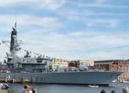 Image of large British warship docked at Brown's Wharf in Fell's Point harbor - September 2014 during the Star Spangled Spectacular Celebration in Baltimore, MD