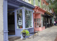 Image of unique & colorful storefronts along historic Charles Street in Federal Hill, a Baltimore neighborhood named one of the 5 Great American Main Streets, located just south of the Inner Harbor, MD