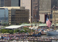 Image of huge crowds of people on the Inner Harbor waterfront enjoying tall ships & the Blue Angels performance & proudly celebrating the 200th anniversary of the writing of our National Anthem at the Star-Spangled Spectacular on September 14, 2014 in Baltimore, MD